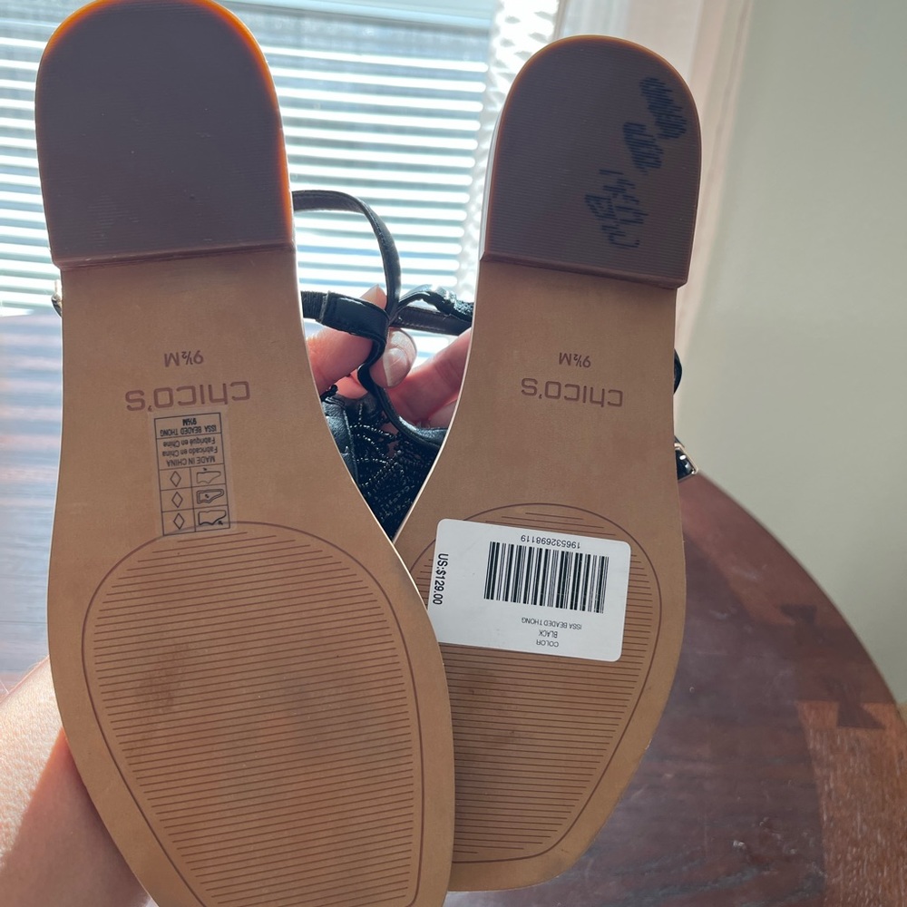 Chico’s black flat, new, no box.